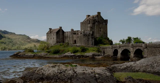 Historic Eilean Donan Castle by Loch Duich, popular medieval Scottish landmark.