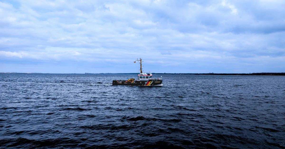 A patrol boat navigating the calm waters of the Baltic Sea near Wismar, Germany.