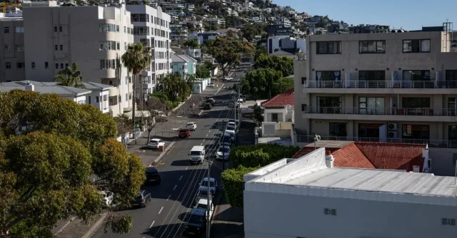 Aerial view of Cape Town's residential streets with modern architecture during daytime.