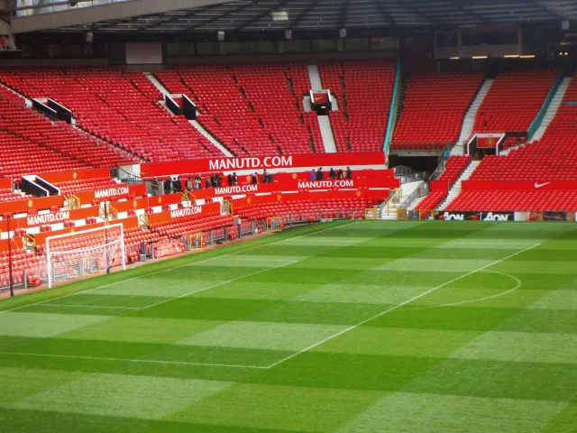 A professional football stadium pitch prepared for a match.