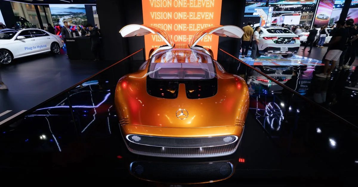 Front view of Mercedes Vision One Eleven concept car at a motor show.
