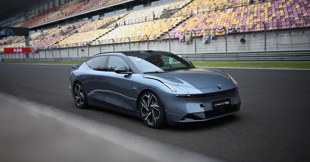 Stylish modern car parked on an empty Shanghai racetrack during the day.
