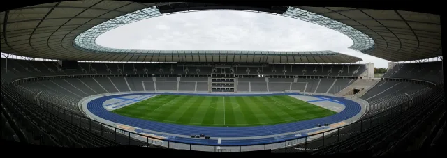 A professional football stadium pitch during a match.