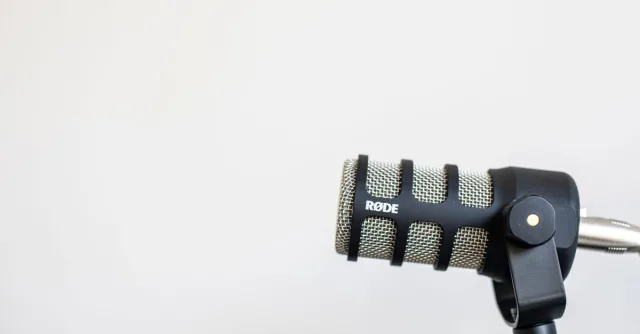 High-quality studio shot of a RØDE microphone against a plain background.