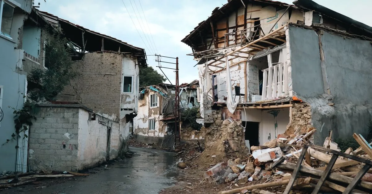 Destroyed buildings in an urban area after an earthquake.