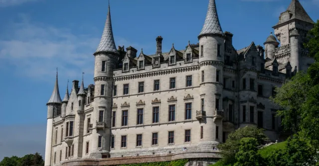 Elegant viewpoint of Dunrobin Castle, showcasing its architectural grandeur in Scotland's scenic landscape.